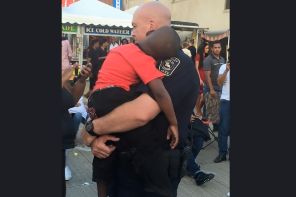 He Fell Asleep in a Police Officer’s Arms—But That’s Not Why People Whispered