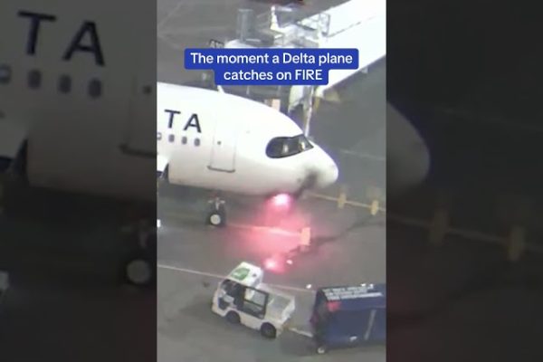 Terrifying moment Delta plane catches on FIRE forcing passengers to flee